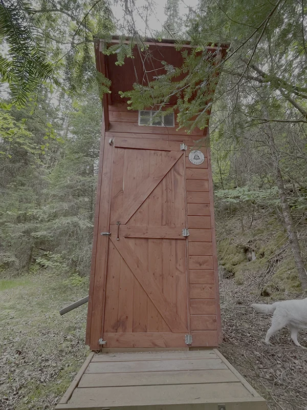 An exterior outhouse photo