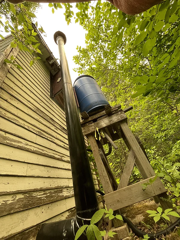 Plumbing exterior of an outhouse